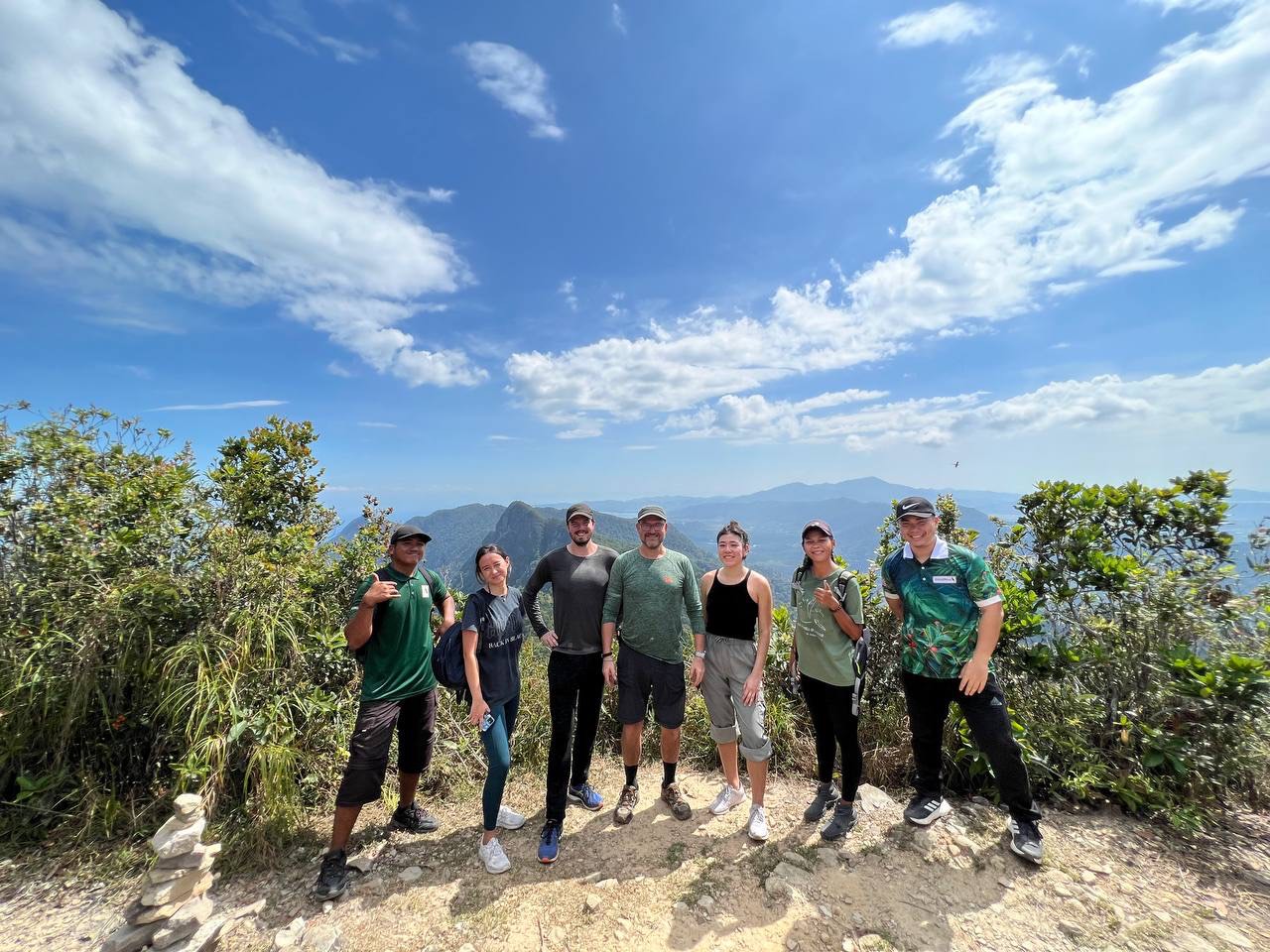 A tour group who have Trekked to the summit of Mount Matchincang Geoforest Park