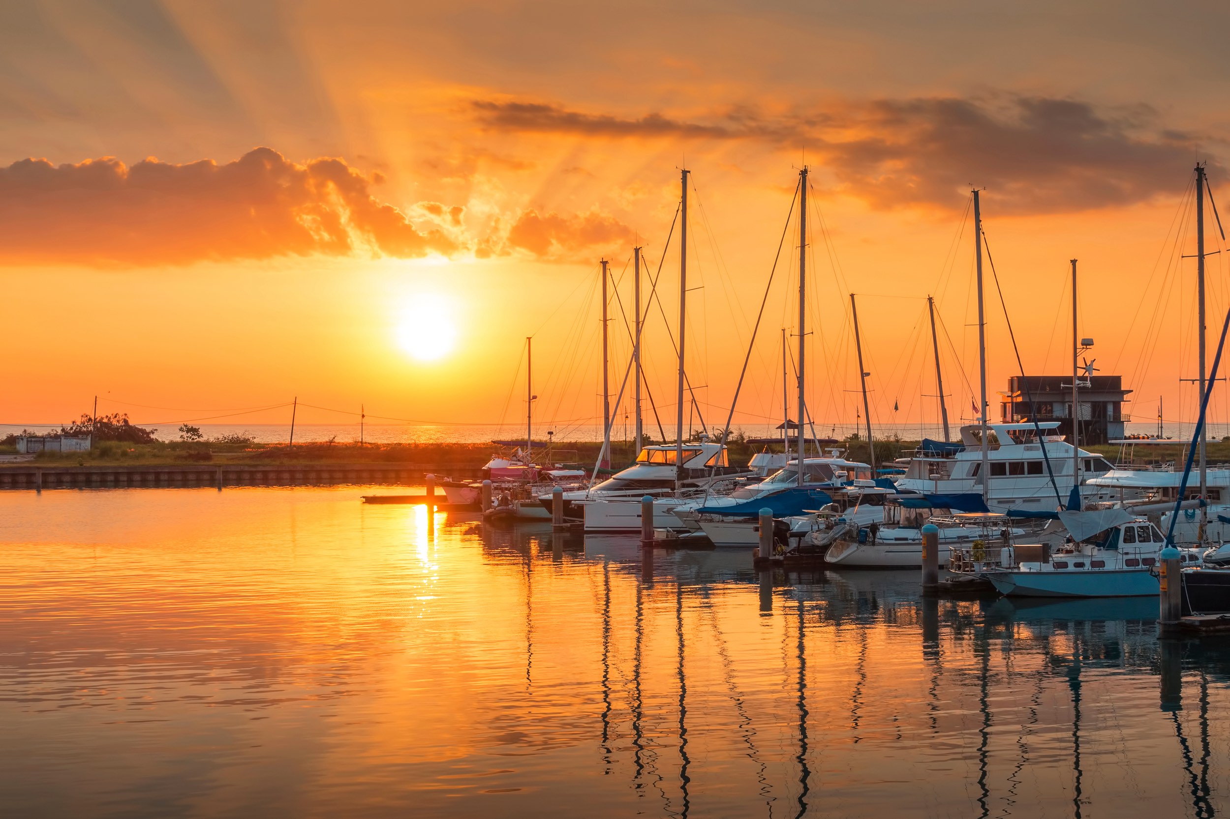 Boats and marina with beautiful sunset